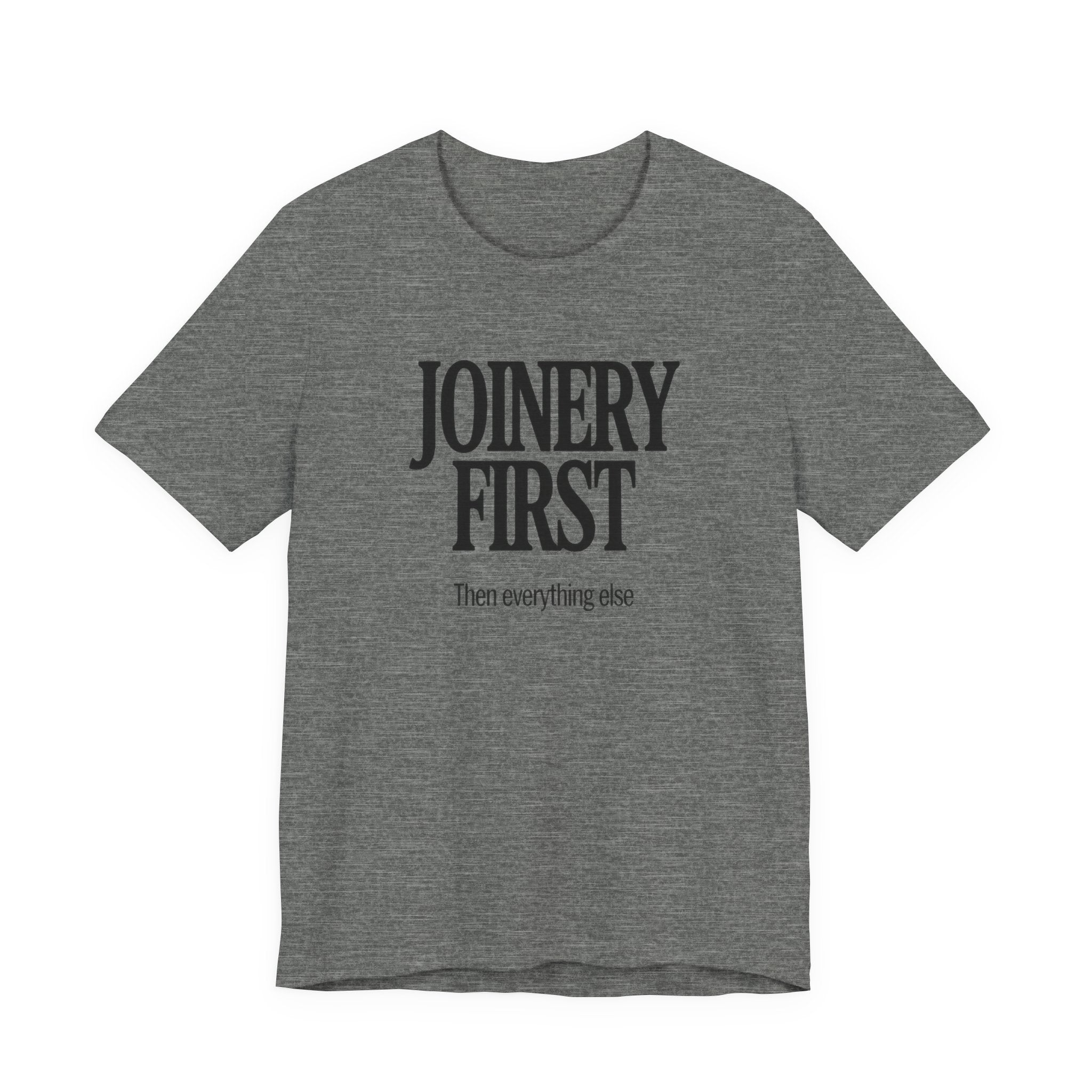 Grey t-shirt with 'JOINERY FIRST Then everything else' text on a white background