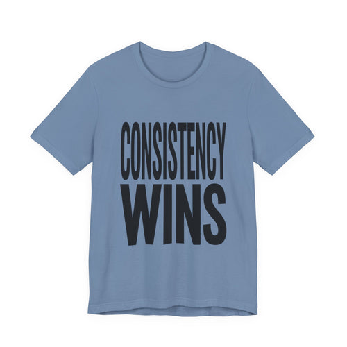 Blue t-shirt with 'CONSISTENCY WINS' text on a white background