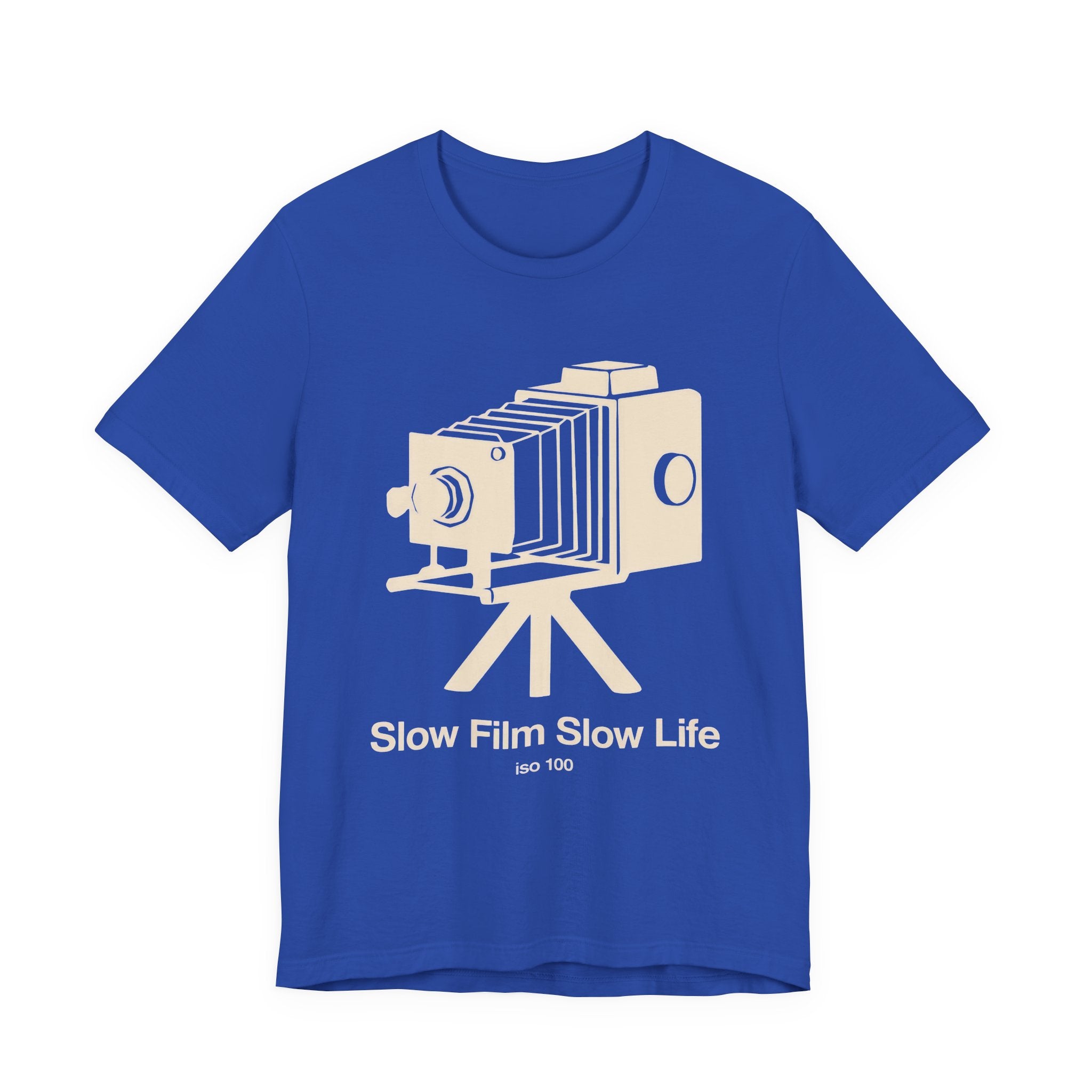 Blue t-shirt with a vintage camera graphic and 'SLOW FILM SLOW LIFE' text on a white background