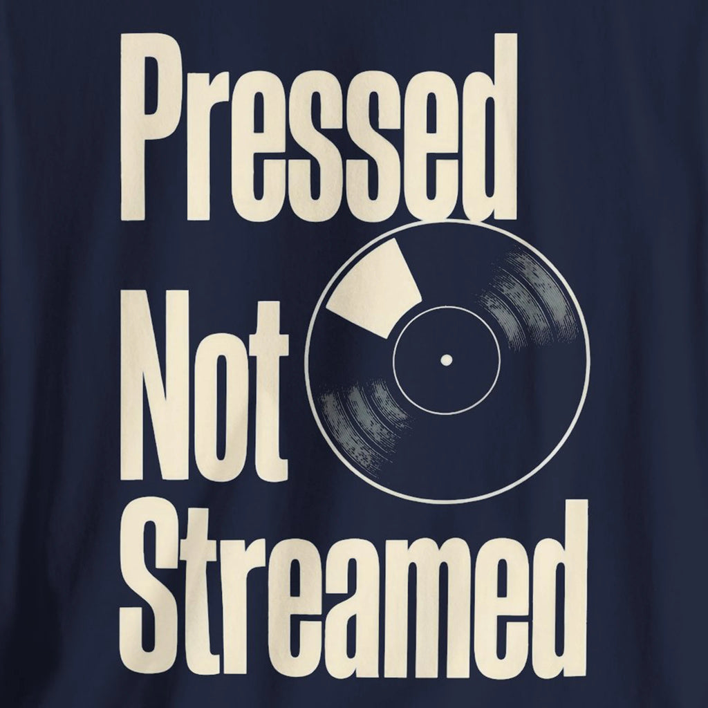 Navy blue t-shirt with vinyl record graphic and text 'Pressed Not Streamed' on a dark background