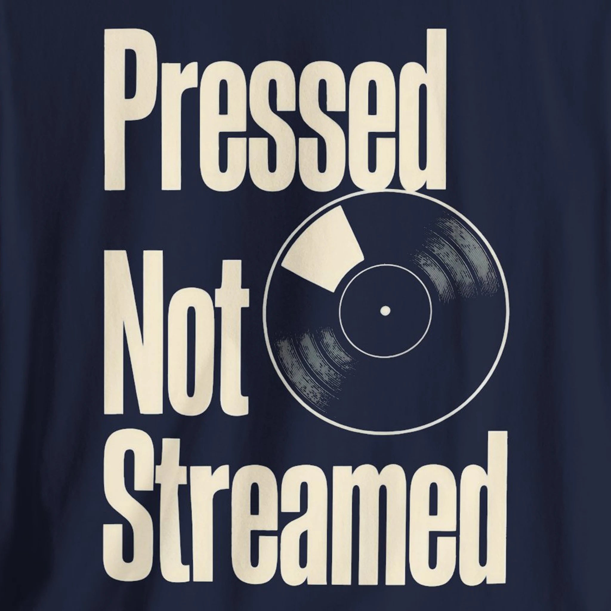 Navy blue t-shirt with vinyl record graphic and text 'Pressed Not Streamed' on a dark background