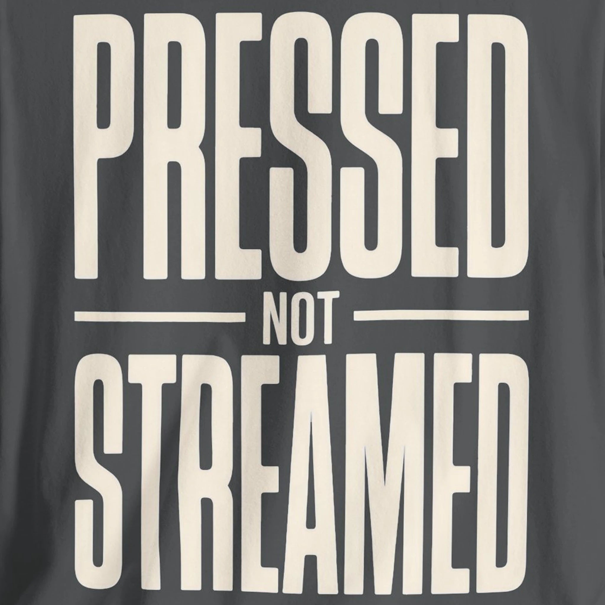 Text 'Pressed Not Streamed' on a dark background