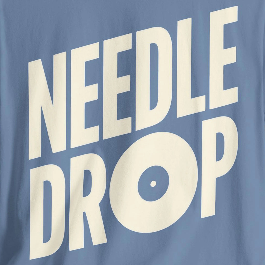Text 'NEEDLE DROP' on a blue background