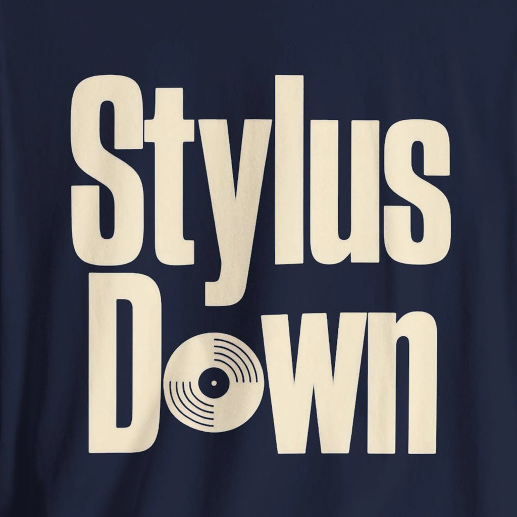 Navy blue shirt with 'Stylus Down' text in beige on a dark background