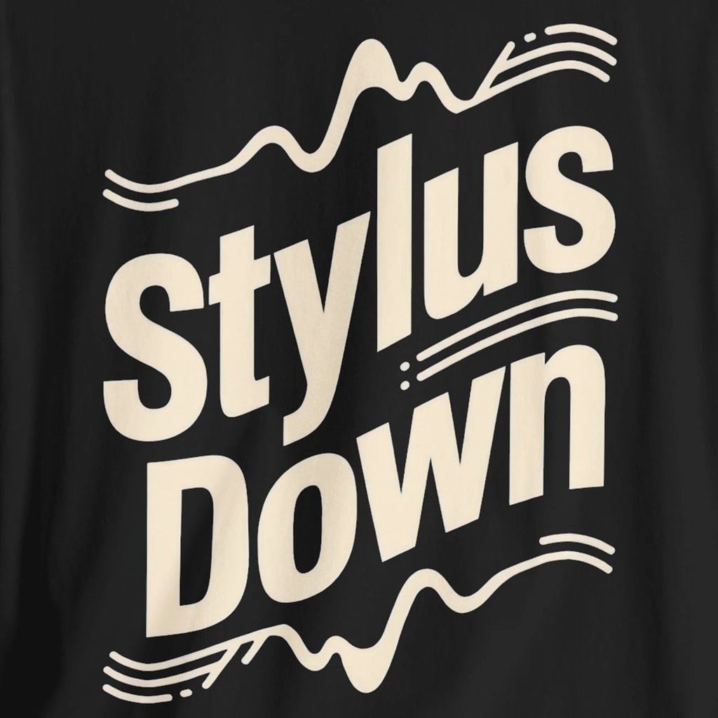 Black t-shirt with 'Stylus Down' text in beige on a black background