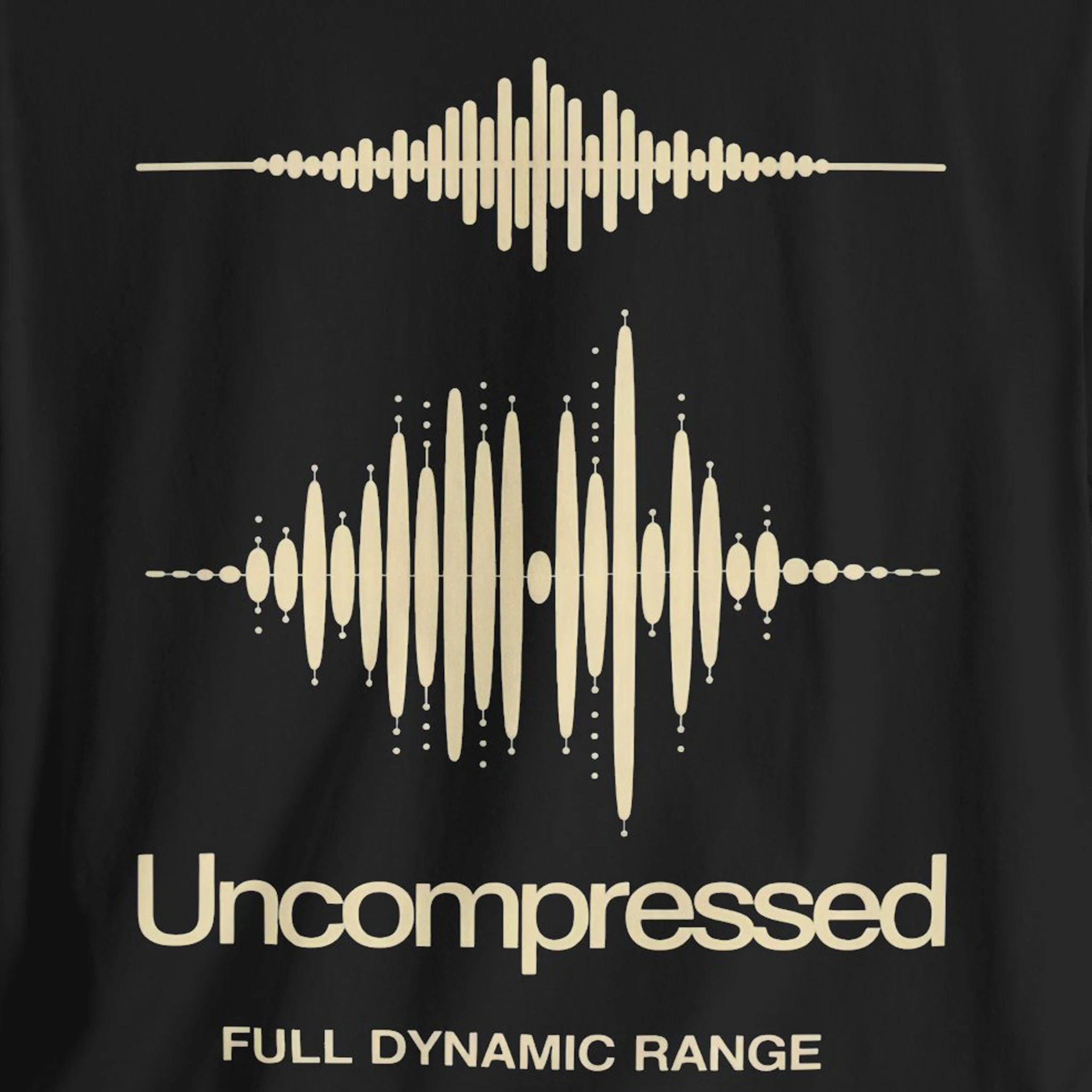 Black t-shirt with beige sound wave design and 'Uncompressed Full Dynamic Range' text.