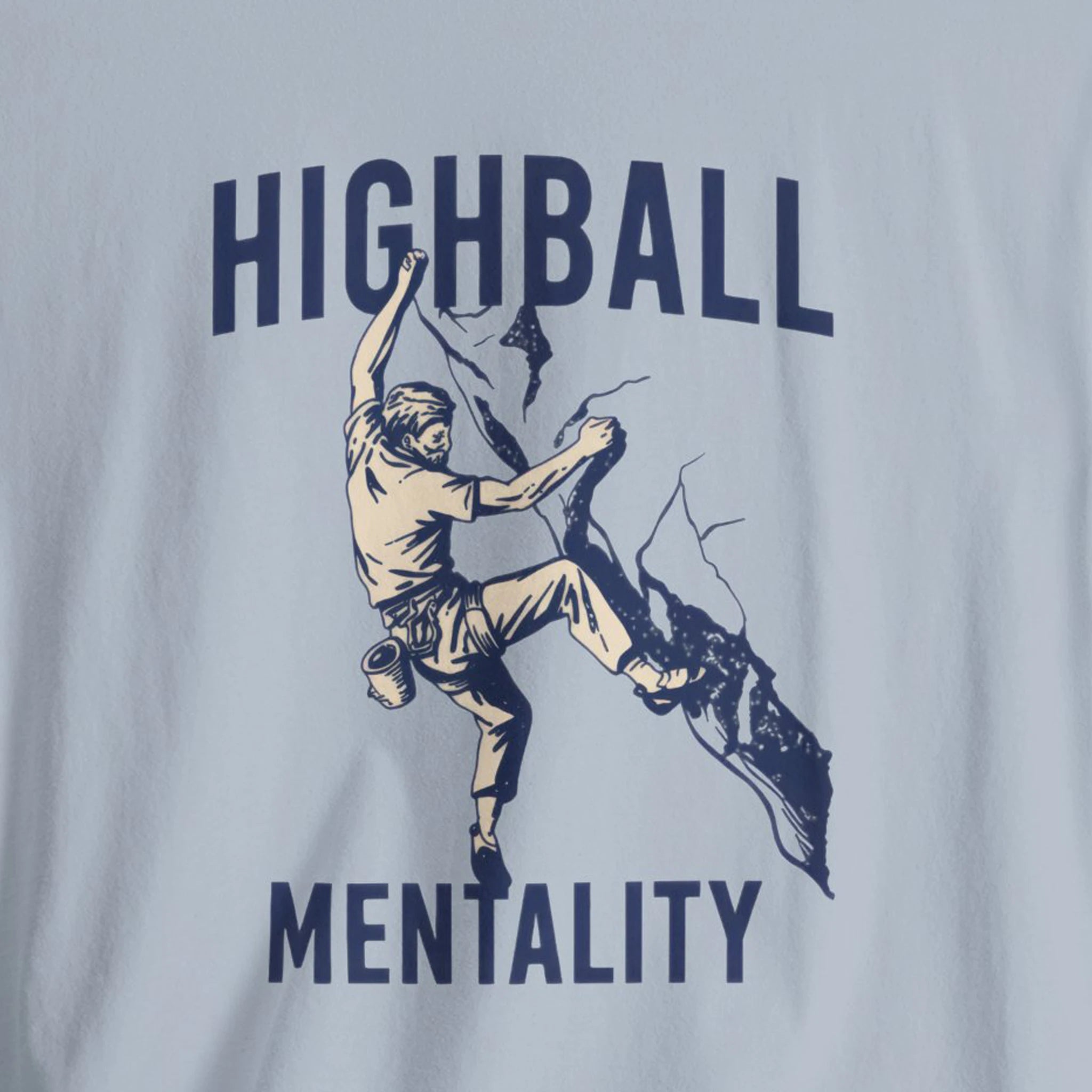 T-shirt with graphic of a person climbing and text 'HIGHBALL MENTALITY' on a light gray background