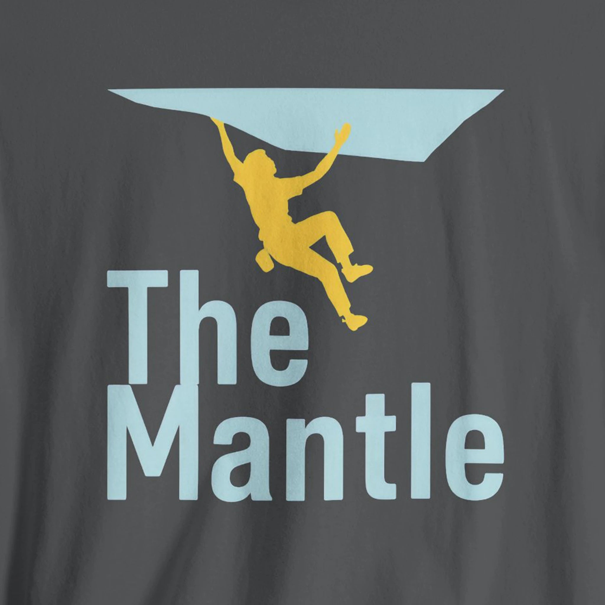T-shirt with 'The Mantle' graphic design featuring a climber silhouette.