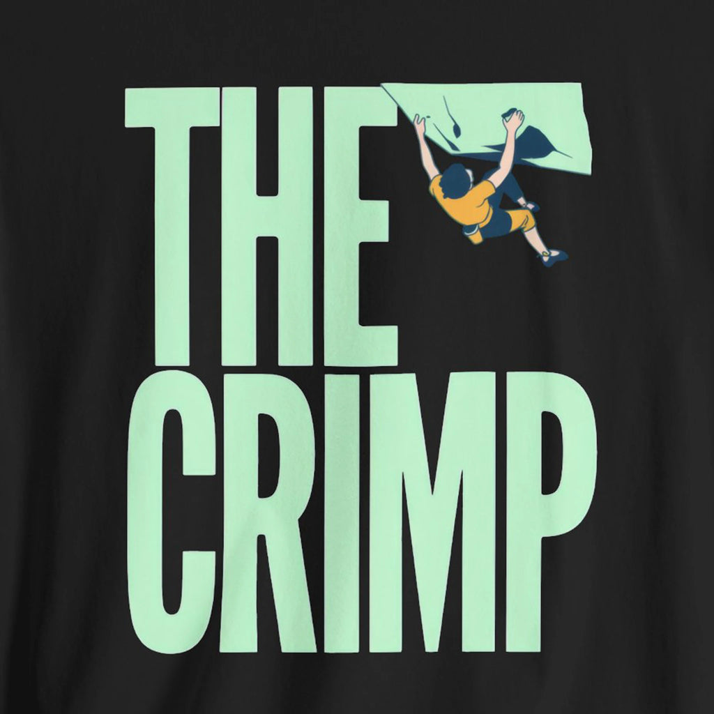 Black t-shirt with 'The Crimp' graphic and climbing illustration on a black background