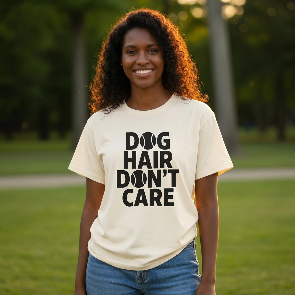 Person wearing a 'Dog Hair Don't Care' t-shirt in an outdoor setting