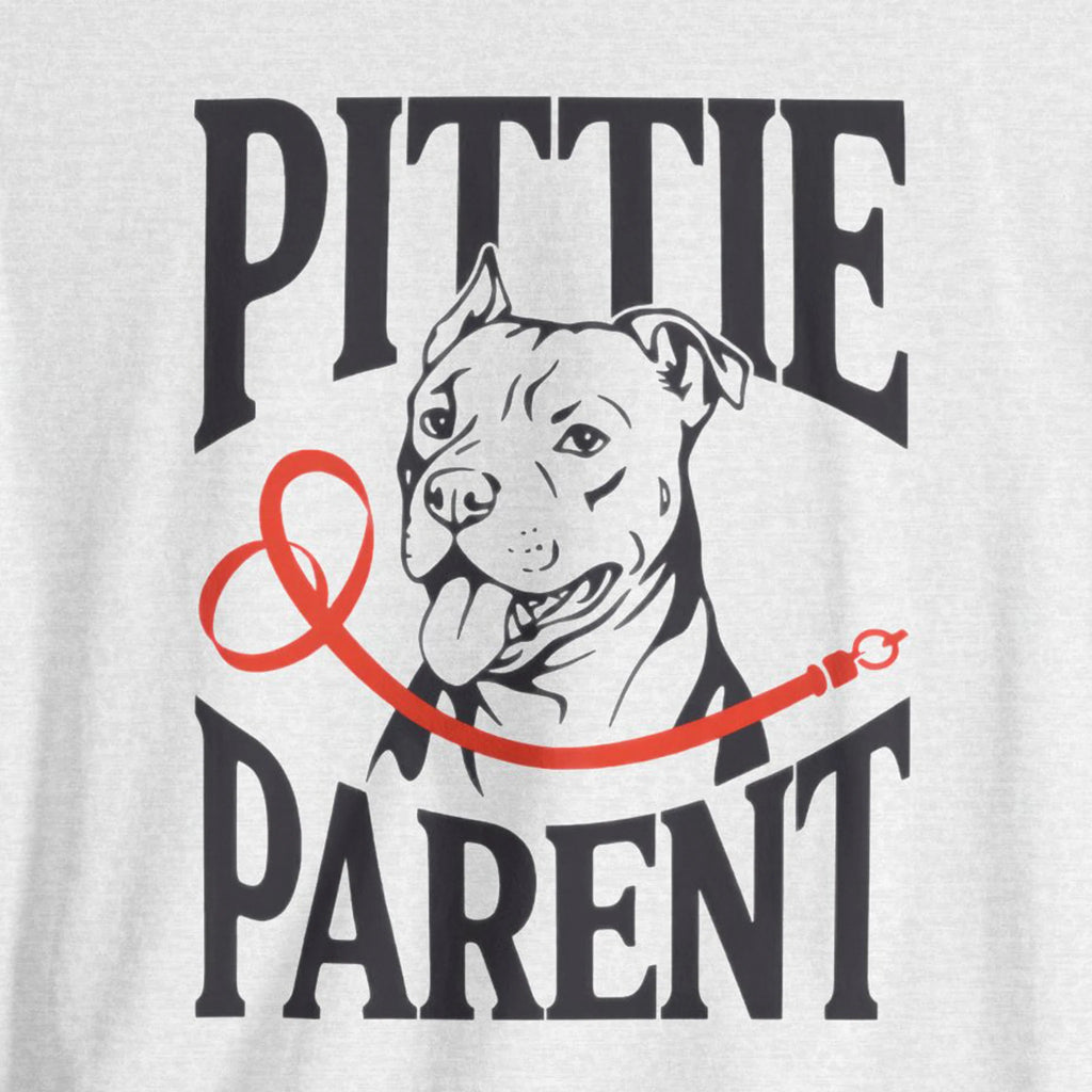 T-shirt with a graphic of a dog and text 'Pittie Parent' on a light gray background