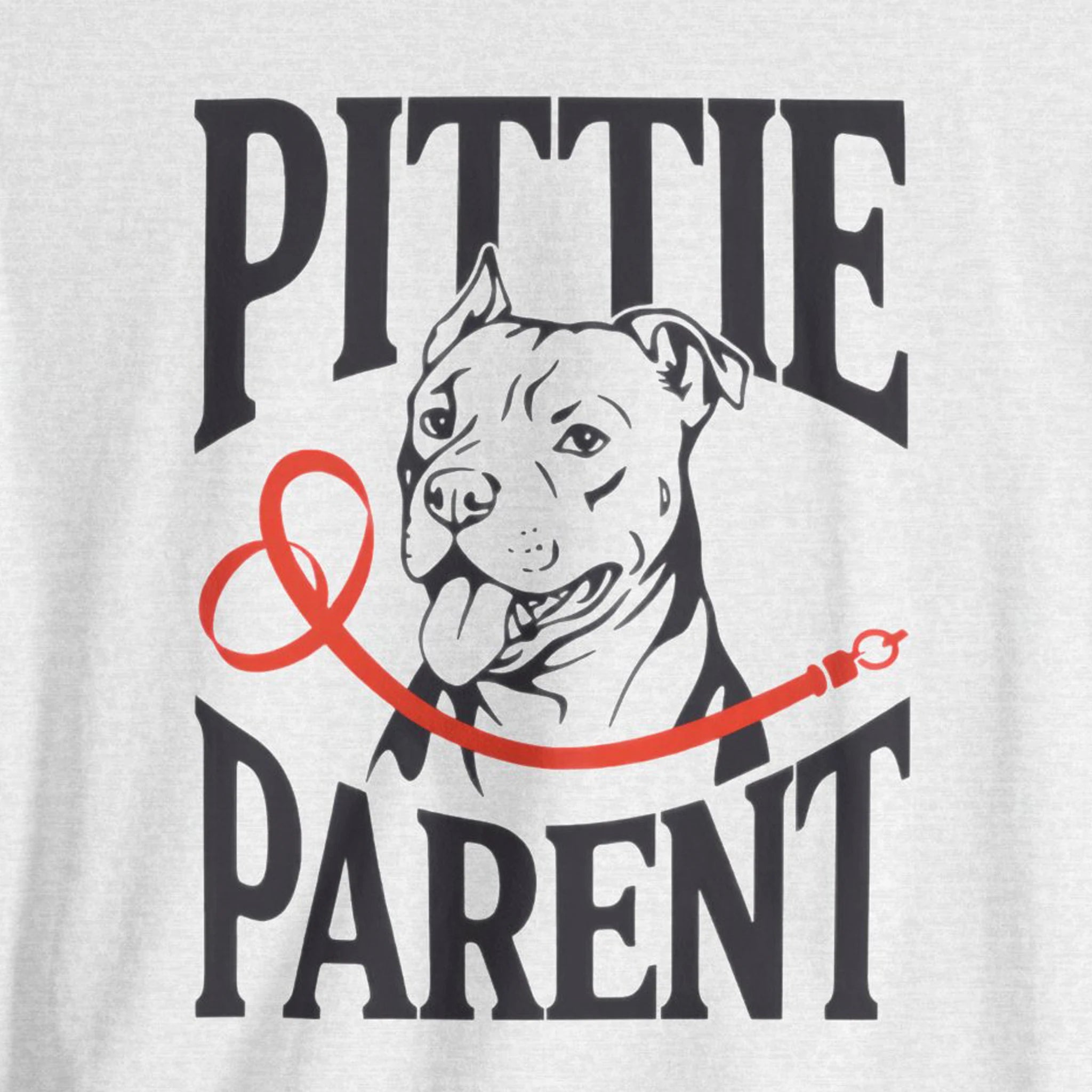 T-shirt with a graphic of a dog and text 'Pittie Parent' on a light gray background