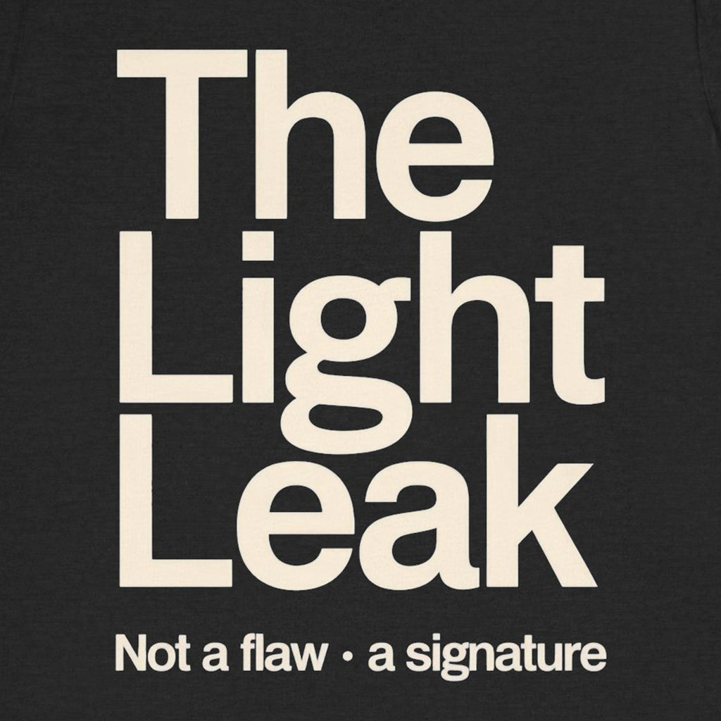 Black t-shirt with 'The Light Leak' text in white on a black background