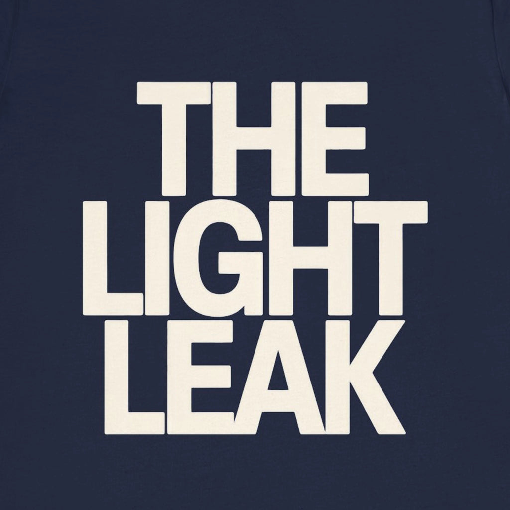 Text 'THE LIGHT LEAK' in white on a dark blue background