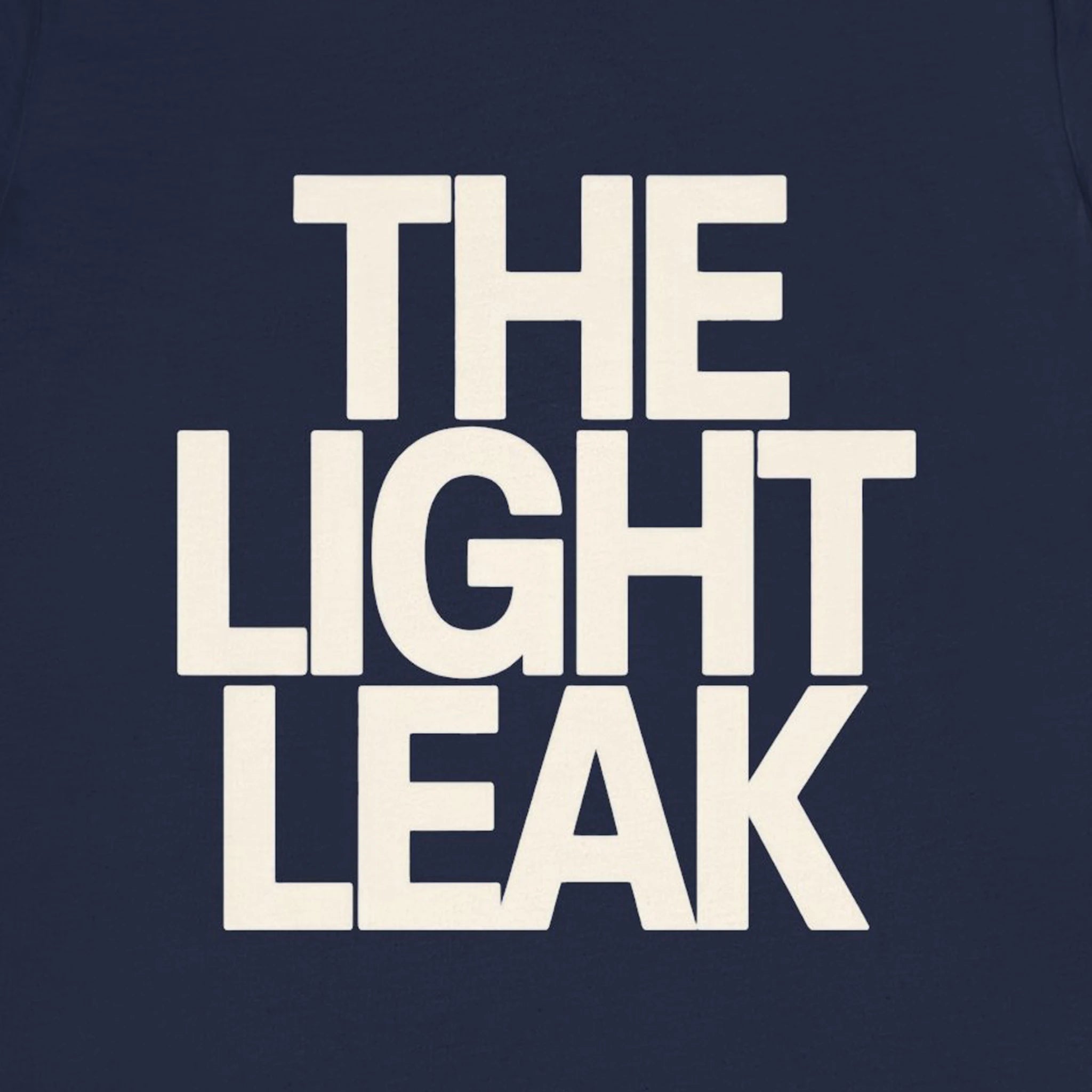 Text 'THE LIGHT LEAK' in white on a dark blue background
