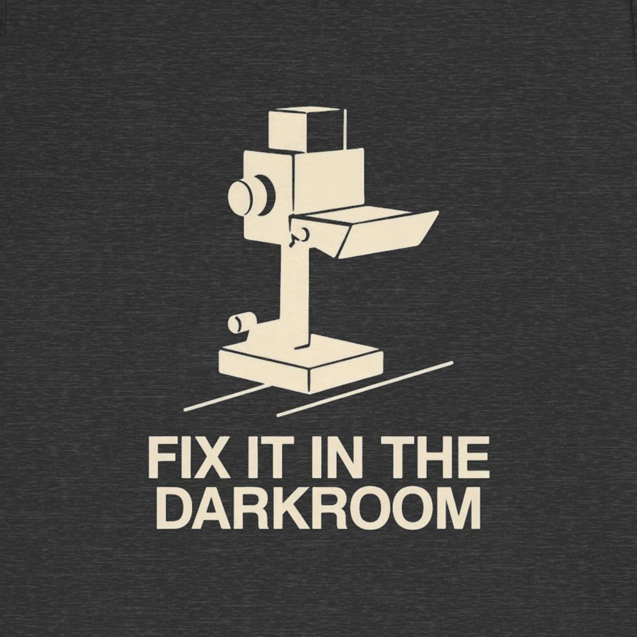 Vintage camera graphic with 'Fix It in the Darkroom' text on a dark background