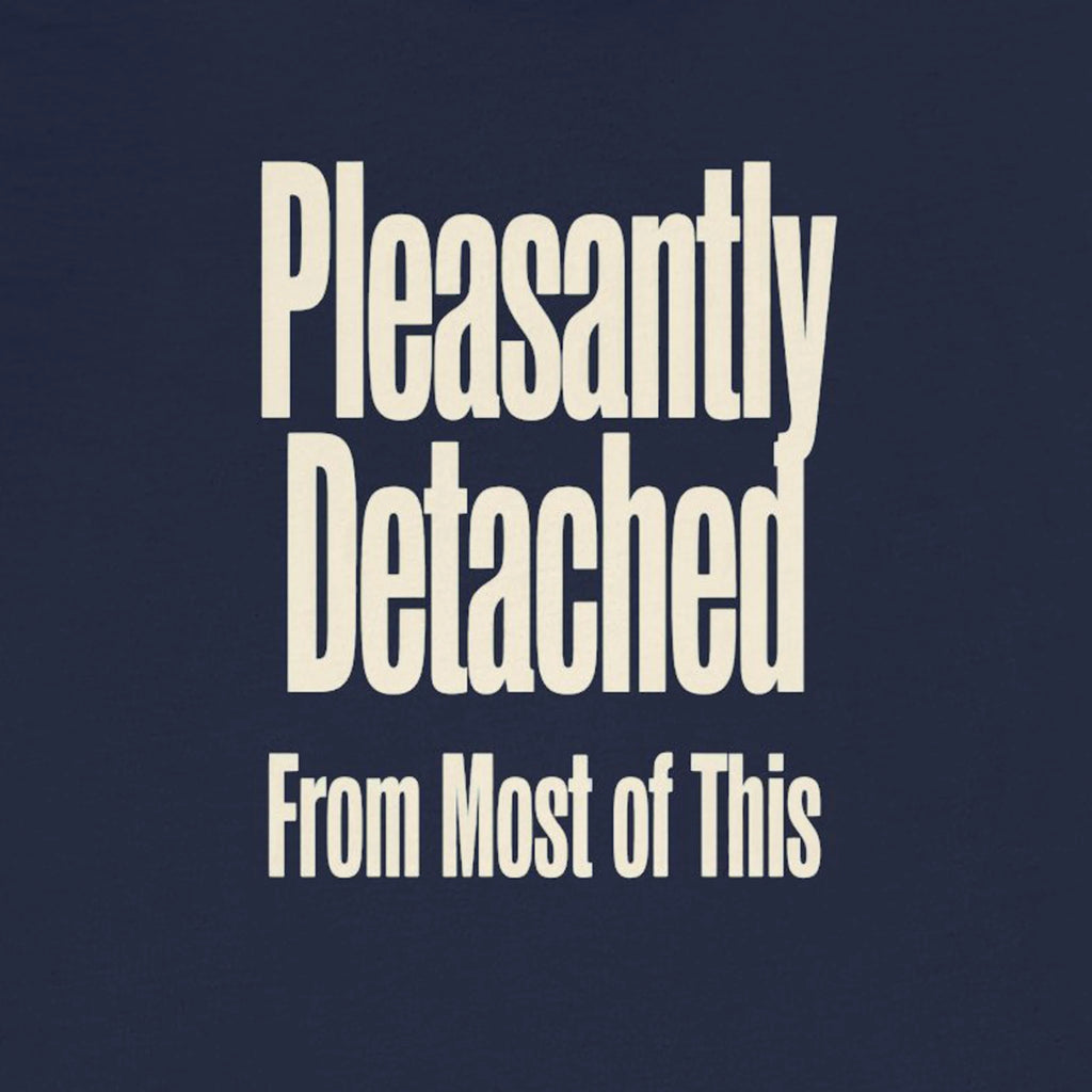 Text 'Pleasantly Detached From Most of This' on a dark blue background