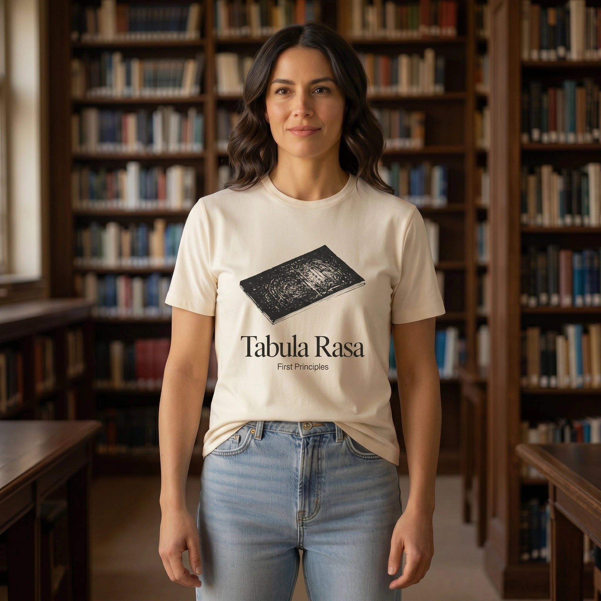 Person wearing a 'Tabula Rasa' t-shirt in a library setting