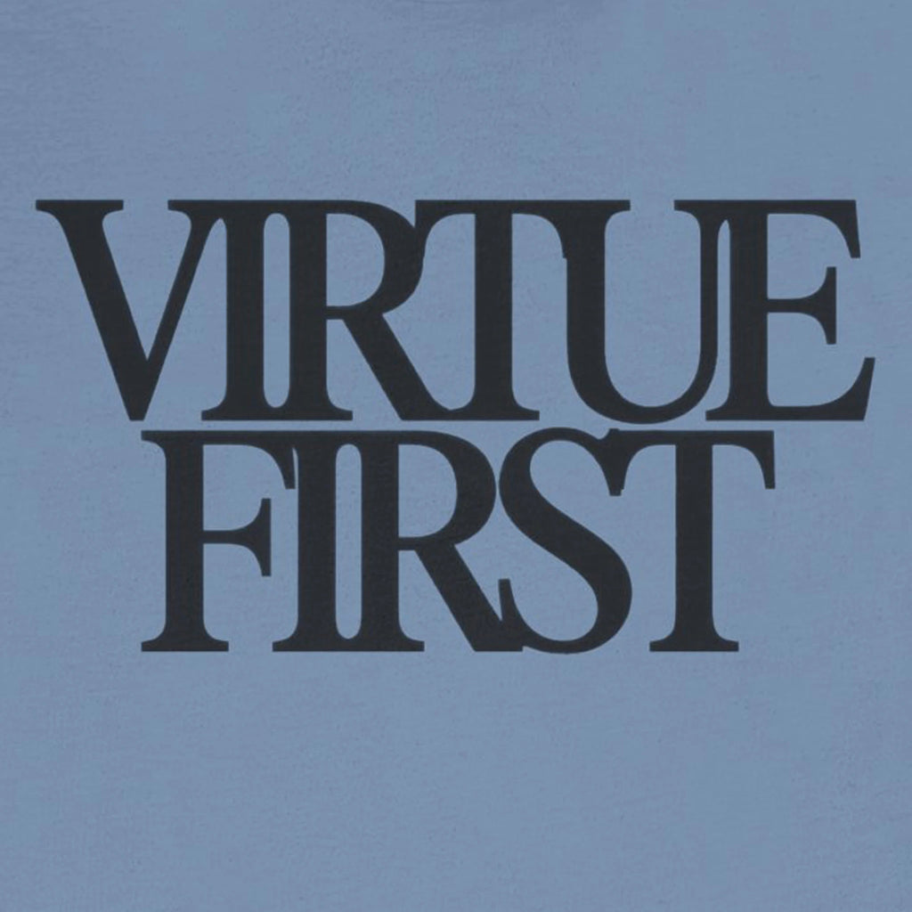 Text 'Virtue First' in black on a light blue background