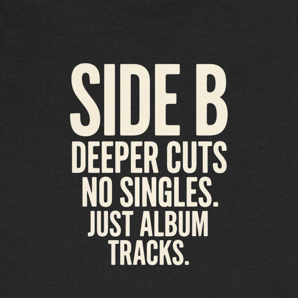Black t-shirt with white text 'SIDE B DEEPER CUTS NO SINGLES. JUST ALBUM TRACKS.'