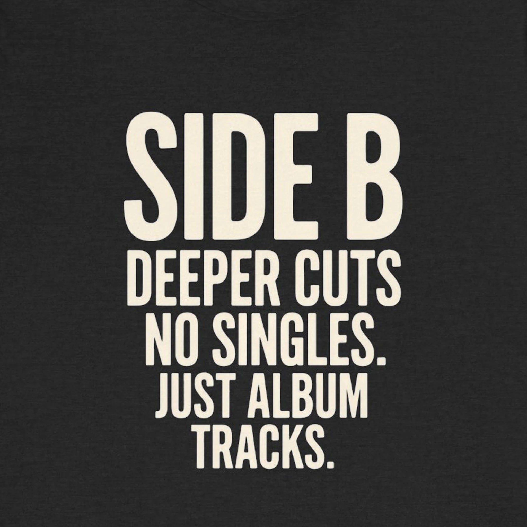 Black t-shirt with white text 'SIDE B DEEPER CUTS NO SINGLES. JUST ALBUM TRACKS.'