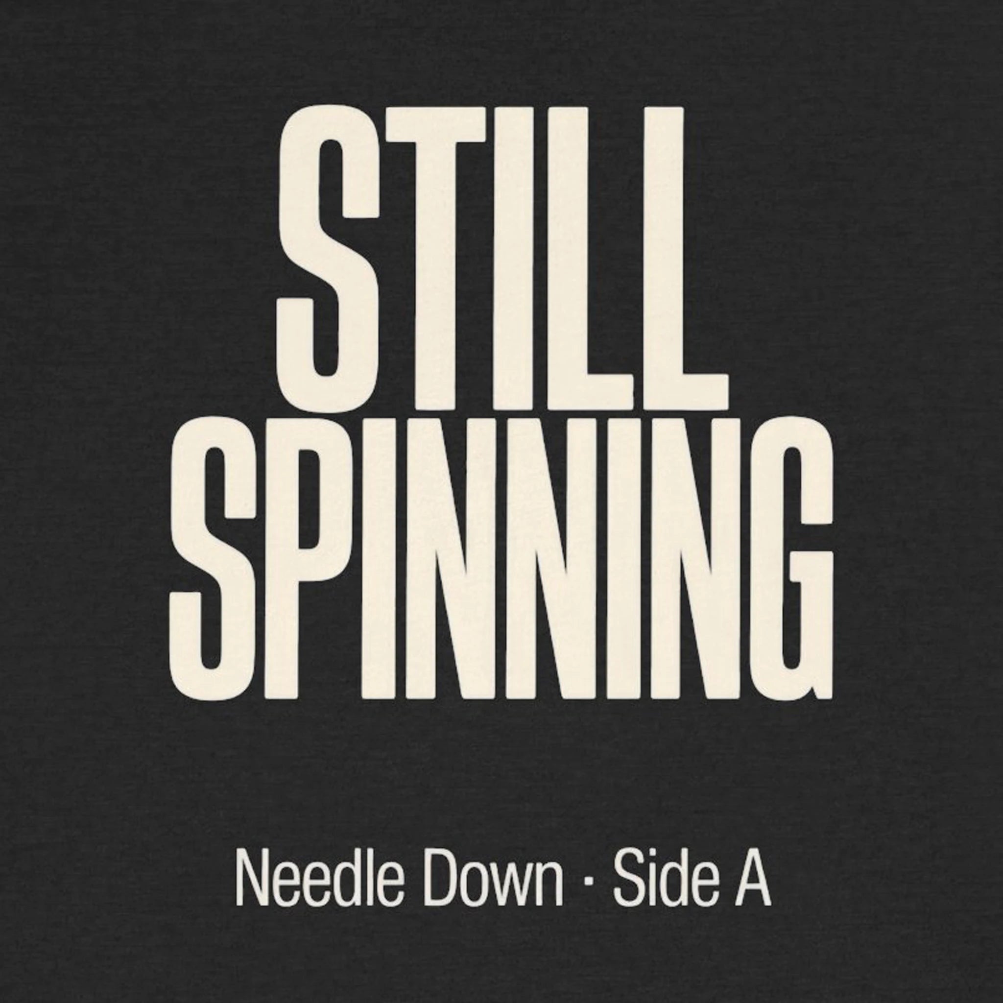 Text 'STILL SPINNING Needle Down · Side A' on a black background