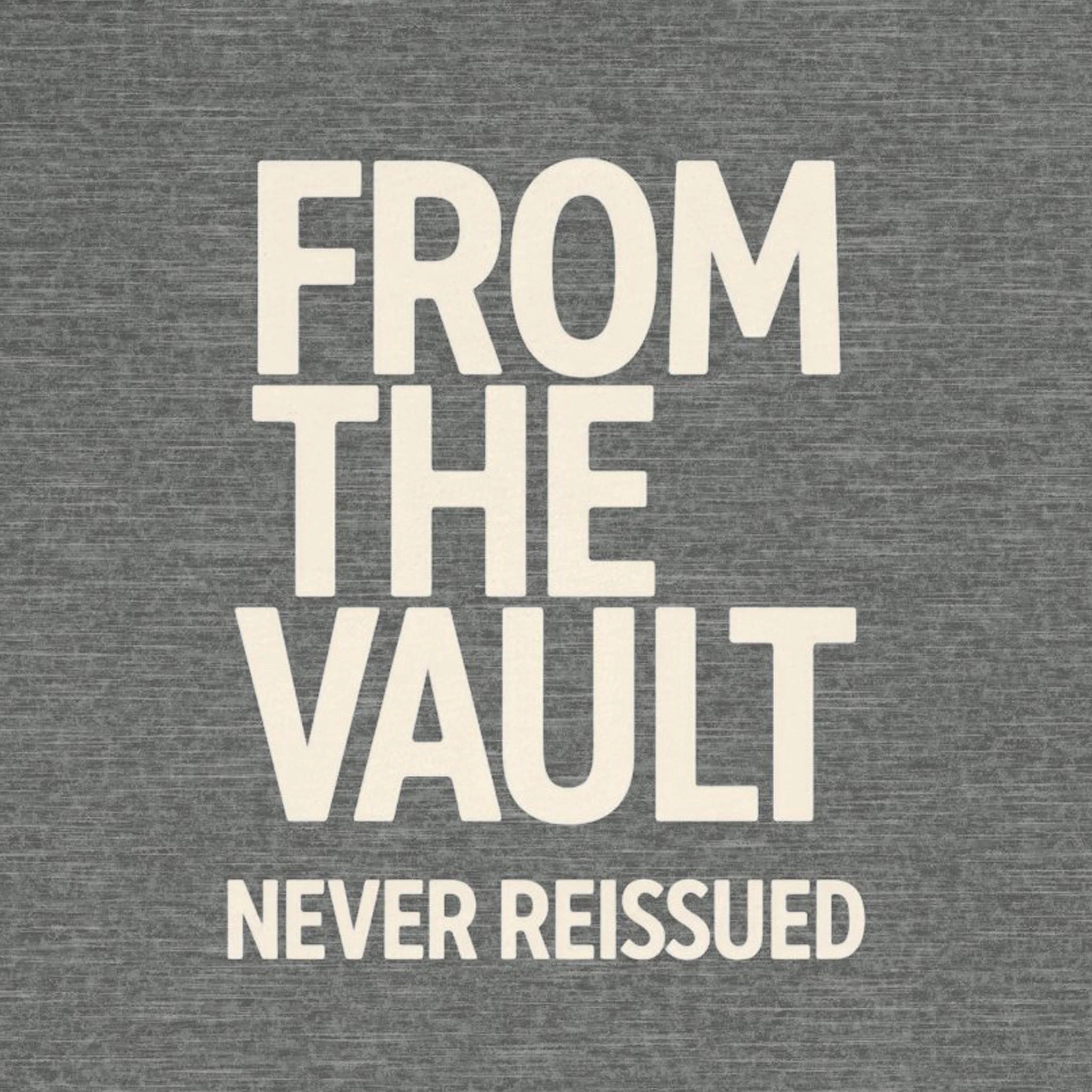 Text 'FROM THE VAULT NEVER REISSUED' on a gray background