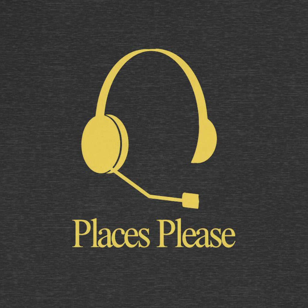 Yellow headset with 'Places Please' text on a black background
