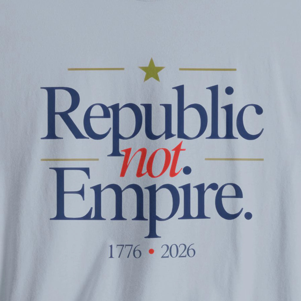 T-shirt with 'Republic not Empire' text and a star on a light blue background