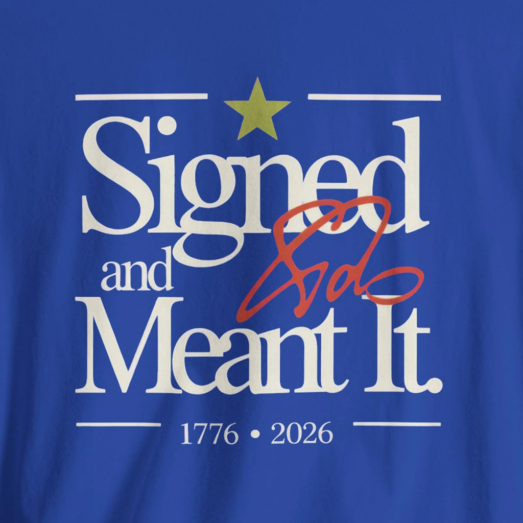 Blue t-shirt with 'Signed and Meant It' text and star design 