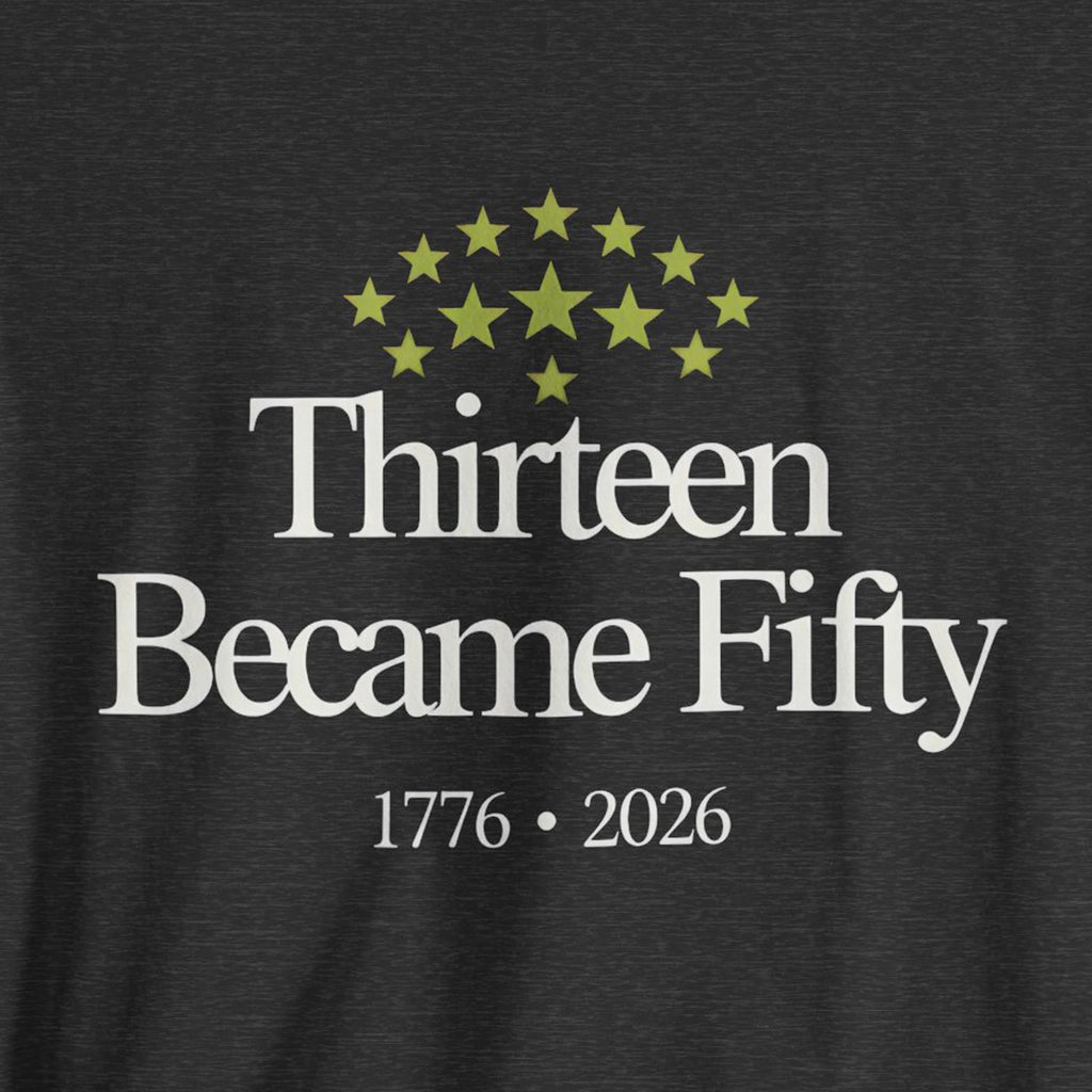 Black t-shirt with 'Thirteen Became Fifty' text and star design on a dark background