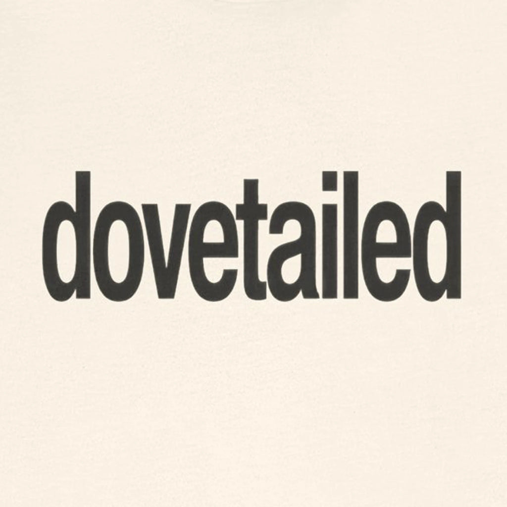 Text 'dovetailed' on a beige background